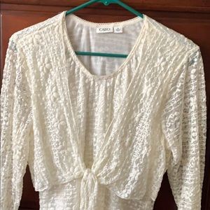 A top very Lacey has long sleeves.